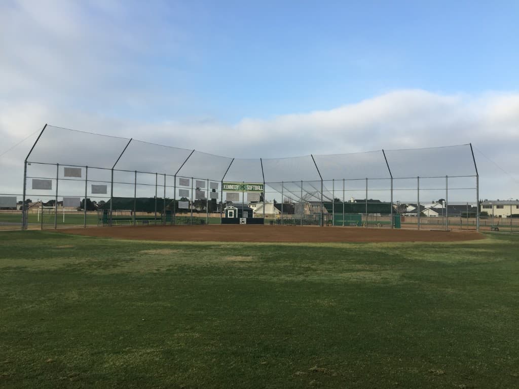 Chain link backstop at a softball field