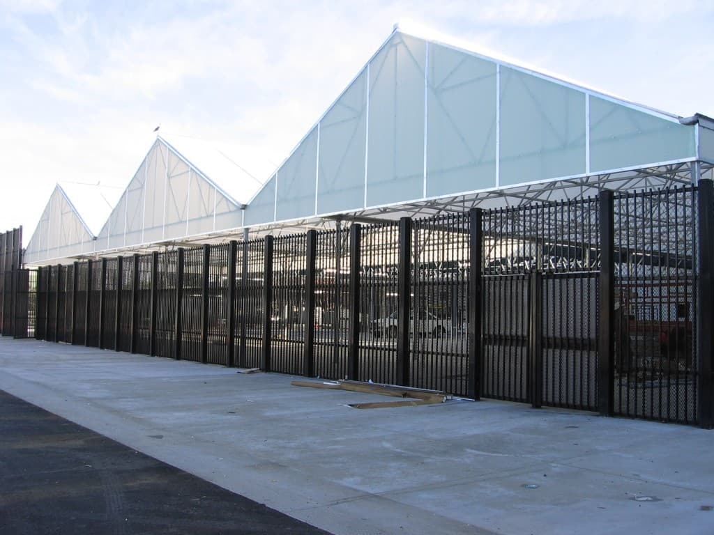 Expanded metal security fence at a warehouse